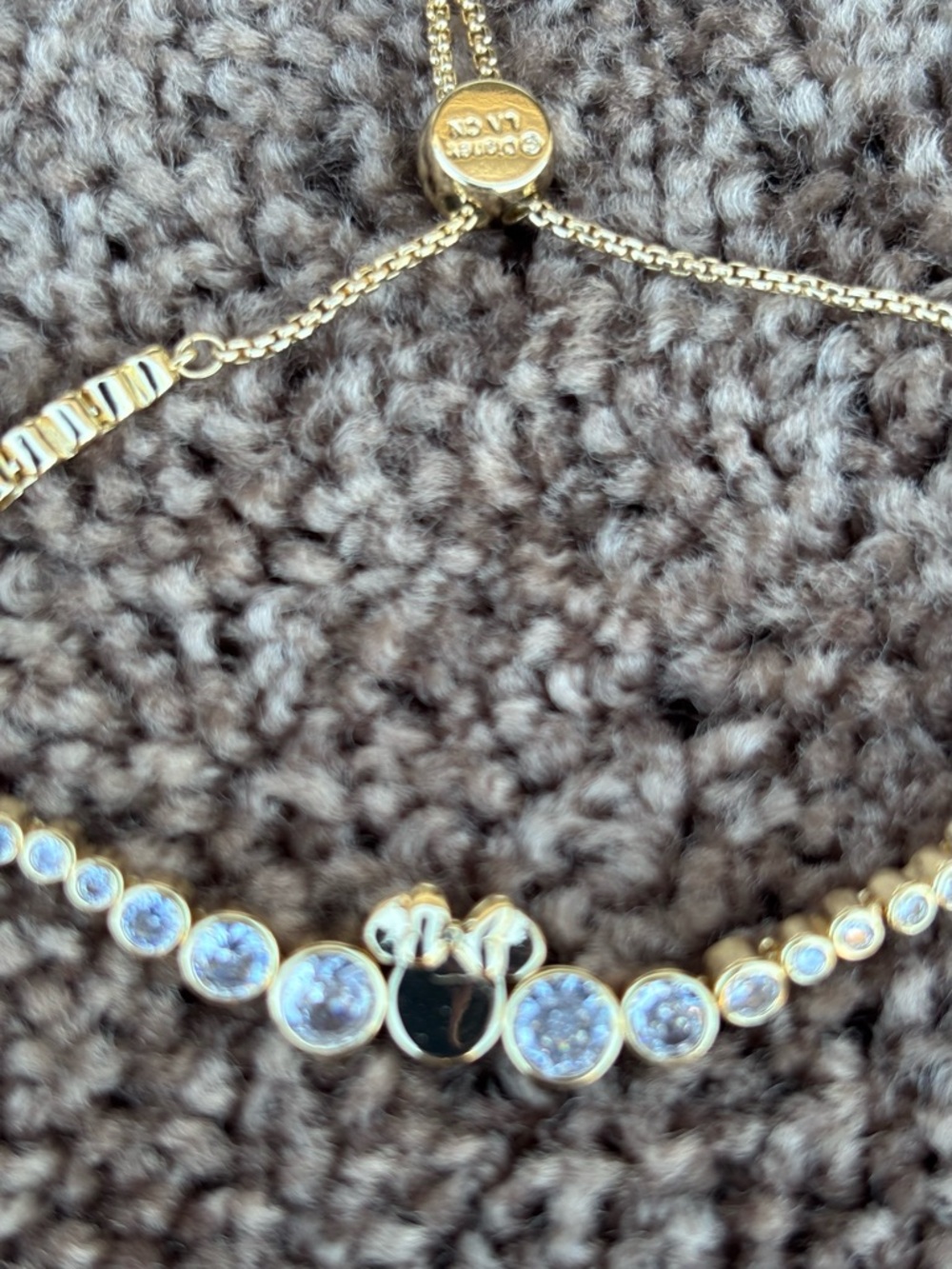 Disney Gold-tone Crystals with CZ stones in an adjustable bracelet